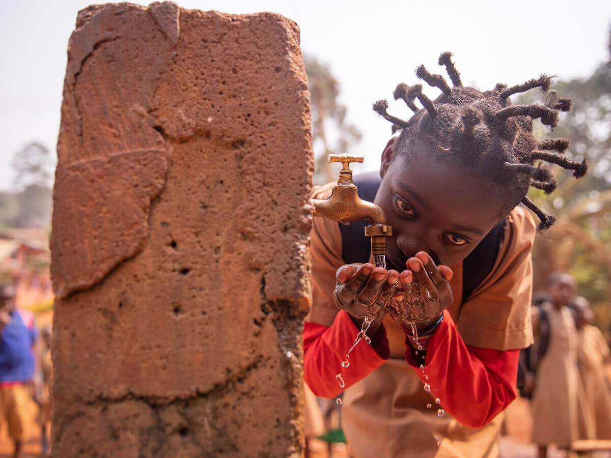 little-black-girl-quenches-her-thirst-with-water.jpg